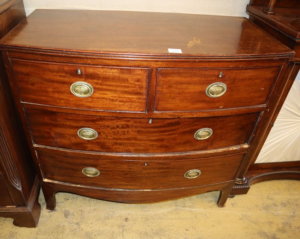 A Regency mahogany bowfront chest, two short and two long graduated drawers, on swept bracket feet, W.97cm, D.49cm, H.90cm